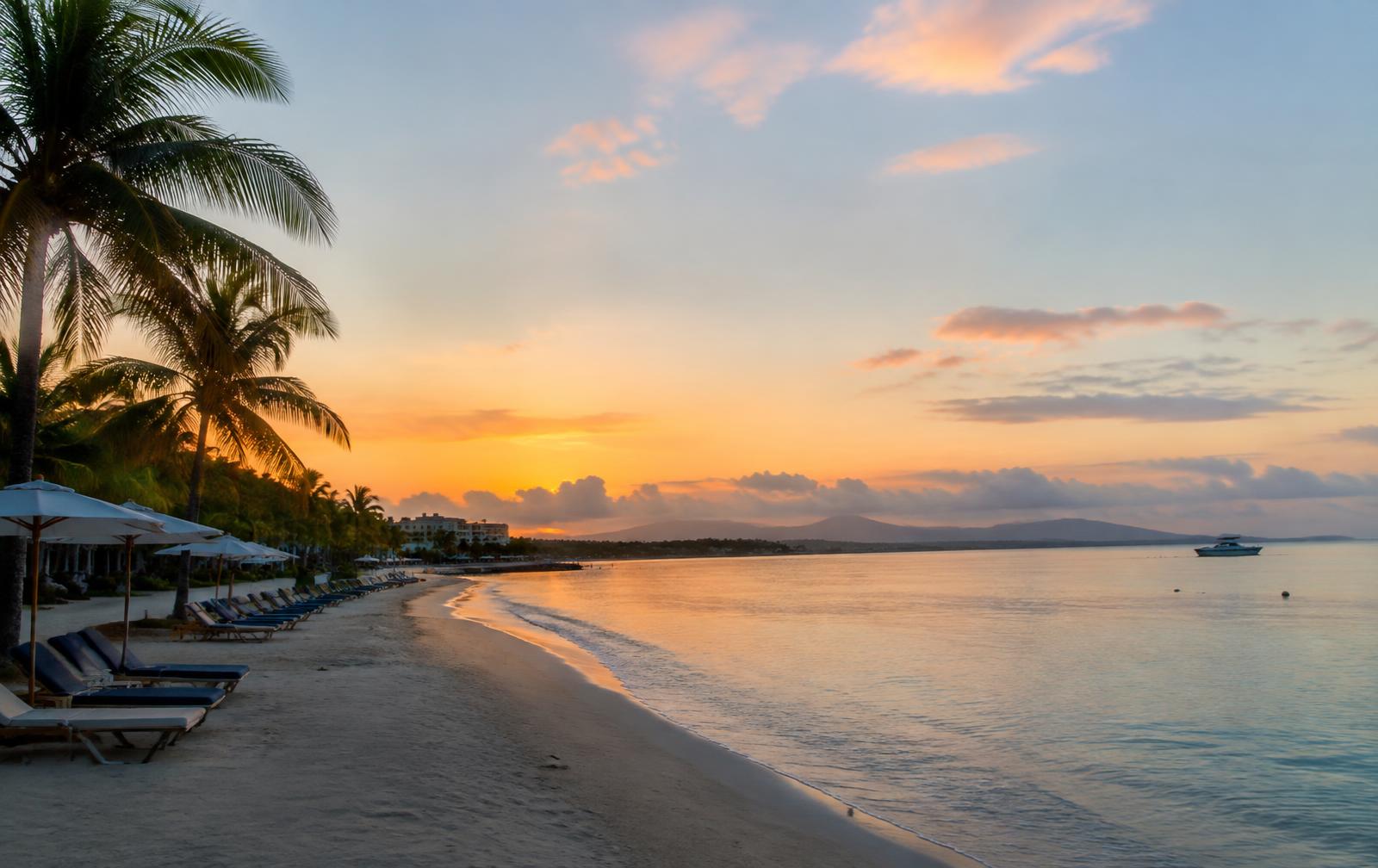 Calm early morning light over a Montego Bay resort beach on departure day